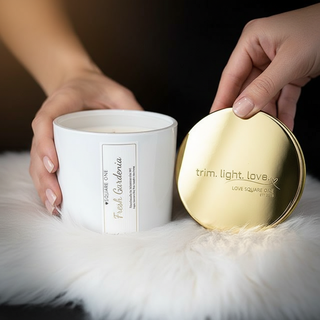Ai generated image of our cedarwood and leather candle on a white furry surface.