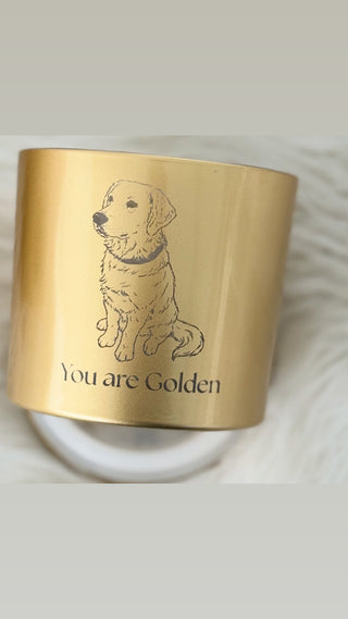 Gold candle jar with a dog illustration and 'You are Golden' text on a white background