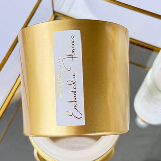 Gold-wrapped product with a label on a reflective surface