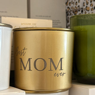 Gold canister with 'Best Mom Ever' text on a white surface