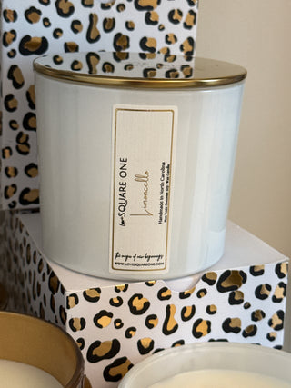 Candle in a decorative box with leopard print pattern