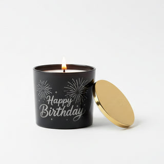 Happy birthday black candle on wood table