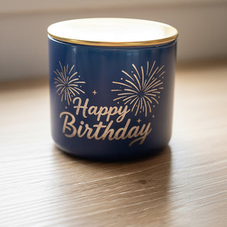 Happy birthday black candle on wood table